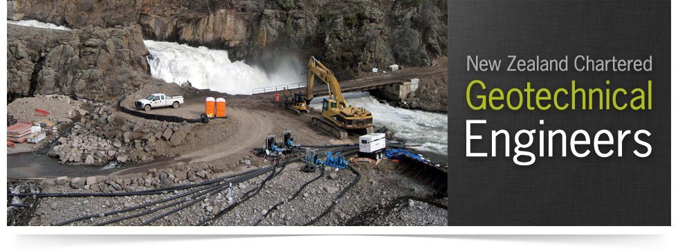 Excavator and pumping equipment working below a waterfall in a rocky river gorge — New Zealand Chartered Geotechnical Engineers